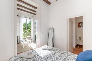 Postel nebo postele na pokoji v ubytování Vistamar 1: Primera línea de mar con encanto