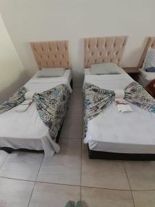 Cama o camas de una habitación en Pousada Sossego