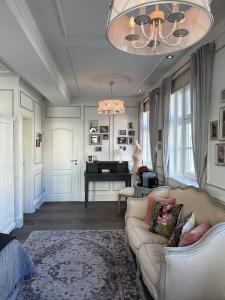 Ein Sitzbereich in der Unterkunft Boutique-Hotel Stadtvilla Hodes