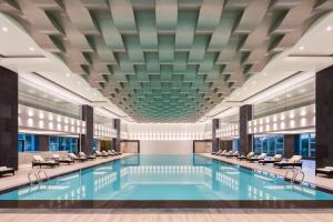 Bassein majutusasutuses Radisson Blu Hotel Wuhan ETD Zone või selle lähedal