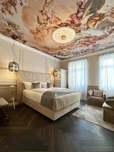 Ein Bett oder Betten in einem Zimmer der Unterkunft Boutique-Hotel Stadtvilla Hodes
