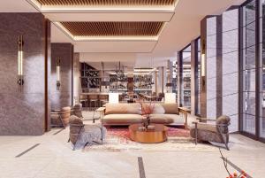 - Reproducción de un vestíbulo con sofá y sillas en Ramada Plaza Sultanahmet By Wyndham, en Estambul