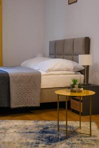 Łóżko lub łóżka w pokoju w obiekcie Narutowicza 5 Apartments