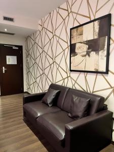 Posezení v ubytování Catone District Hotel
