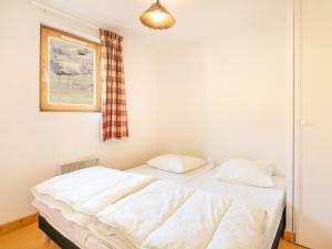 Posteľ alebo postele v izbe v ubytovaní Les chamois - 15 - Appart lumineux - 8 pers