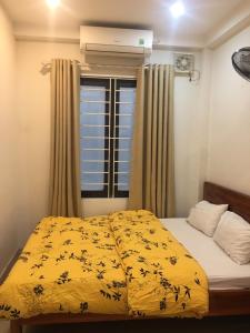 Postel nebo postele na pokoji v ubytování Phòng đơn giường đôi khép kín yên tĩnh + 6 fotografií