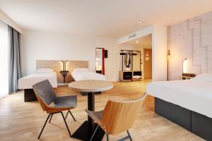 Postel nebo postele na pokoji v ubytování B&B HOTEL Lille Lillenium Eurasanté
