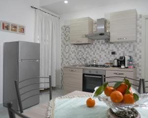 Kuchyň nebo kuchyňský kout v ubytování PONTE VALLE B&B POMPEI