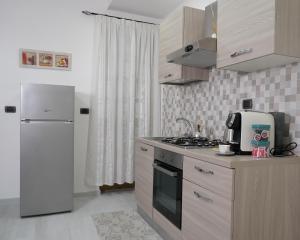 Kuchyň nebo kuchyňský kout v ubytování PONTE VALLE B&B POMPEI