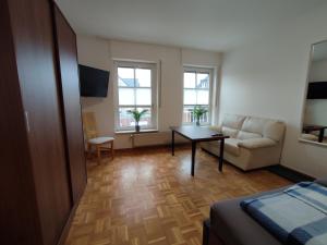 TV a/nebo společenská místnost v ubytování Tempel-inn Klosterstraße