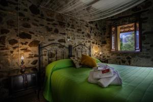 Postel nebo postele na pokoji v ubytování B&B La Voce del Fiume Dimora storica di Charme