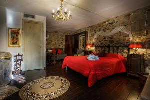 Postel nebo postele na pokoji v ubytování B&B La Voce del Fiume Dimora storica di Charme