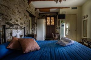 Postel nebo postele na pokoji v ubytování B&B La Voce del Fiume Dimora storica di Charme