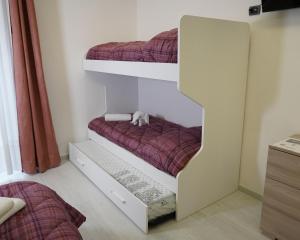 Postel nebo postele na pokoji v ubytování PONTE VALLE B&B POMPEI