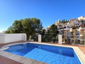 Bazén v ubytování Villa Lucena Private Pool Casasol nebo v jeho okolí