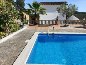The swimming pool at or close to Bright Villa in Vidreres with Private Pool and Jacuzzi