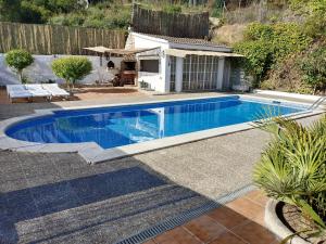 The swimming pool at or close to Bright Villa in Vidreres with Private Pool and Jacuzzi