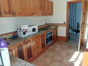 A kitchen or kitchenette at Bright Villa in Vidreres with Private Pool and Jacuzzi