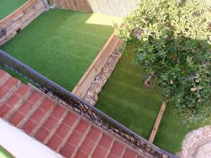 A garden outside Bright Villa in Vidreres with Private Pool and Jacuzzi