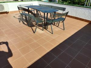 A balcony or terrace at Bright Villa in Vidreres with Private Pool and Jacuzzi