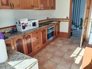 A kitchen or kitchenette at Bright Villa in Vidreres with Private Pool and Jacuzzi