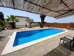 The swimming pool at or close to Bright Villa in Vidreres with Private Pool and Jacuzzi