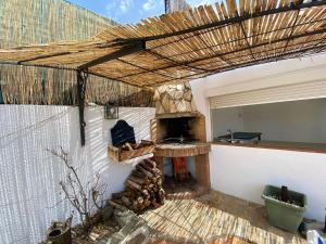 A television and/or entertainment centre at Bright Villa in Vidreres with Private Pool and Jacuzzi