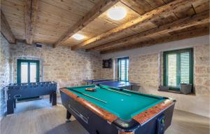 a billiard room with a pool table in it at Gorgeous Home In Kamenmost With Kitchen in Kamenmost