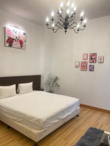 Ein Bett oder Betten in einem Zimmer der Unterkunft Mộc Hương Hotel