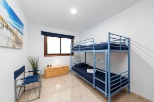 Posteľ alebo postele v izbe v ubytovaní MEDANO4YOU Los Viajeros Holiday Home + 14 fotografií