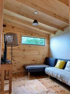 Postel nebo postele na pokoji v ubytování Casa Puente de Chiloé