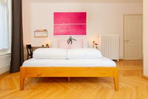 Postel nebo postele na pokoji v ubytování Hotel Beau Séjour Lucerne