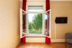 TV a/nebo společenská místnost v ubytování Hotel Beau Séjour Lucerne