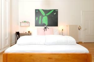 Postel nebo postele na pokoji v ubytování Hotel Beau Séjour Lucerne