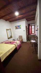 Postel nebo postele na pokoji v ubytování DREAM Hill HOMESTAY NUWARA ELIYA