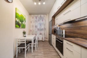 Kuchyň nebo kuchyňský kout v ubytování Joya Mia - the soul of Riga & free parking