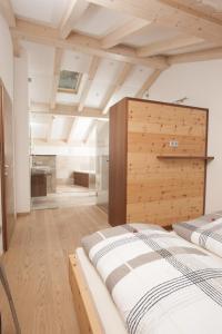 Tempat tidur dalam kamar di Residence Gruberhof