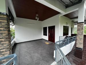 Balkón alebo terasa v ubytovaní Munnar Home stay
