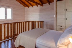 Posteľ alebo postele v izbe v ubytovaní Vissala Village