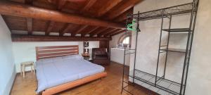 Ένα ή περισσότερα κρεβάτια σε δωμάτιο στο Garda Family House +35 φωτογραφίες