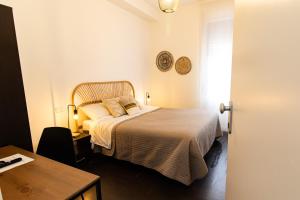 Postel nebo postele na pokoji v ubytování Elisir B & B
