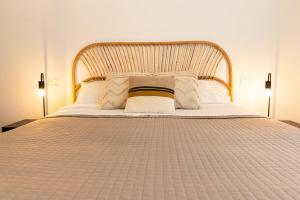 Postel nebo postele na pokoji v ubytování Elisir B & B