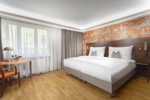 Кровать или кровати в номере ARTIST Boutique Hotel