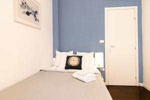 Postel nebo postele na pokoji v ubytování Elisir B & B
