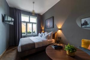 The Viaduct - Suites & More客房内的一张或多张床位