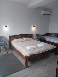 Postel nebo postele na pokoji v ubytování Hotel Avatar
