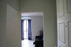 TV a/nebo společenská místnost v ubytování Apartments Via Piave