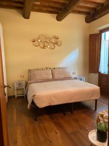 Posteľ alebo postele v izbe v ubytovaní relais L’Imperatore