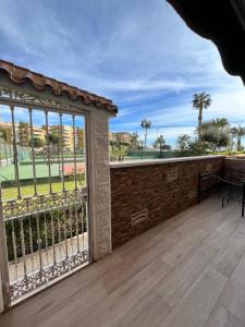 a large balcony with a view of a park at Anne´s Corner in Cala del Moral