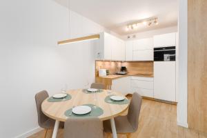 Kuchyňa alebo kuchynka v ubytovaní Nadmorskie Tarasy Apartament 215 A Eltom Tour
